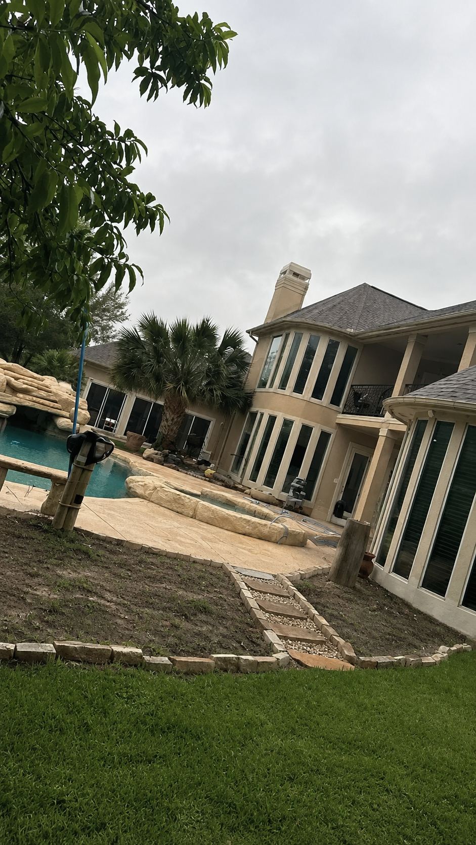 Outdoor living flower bed design before