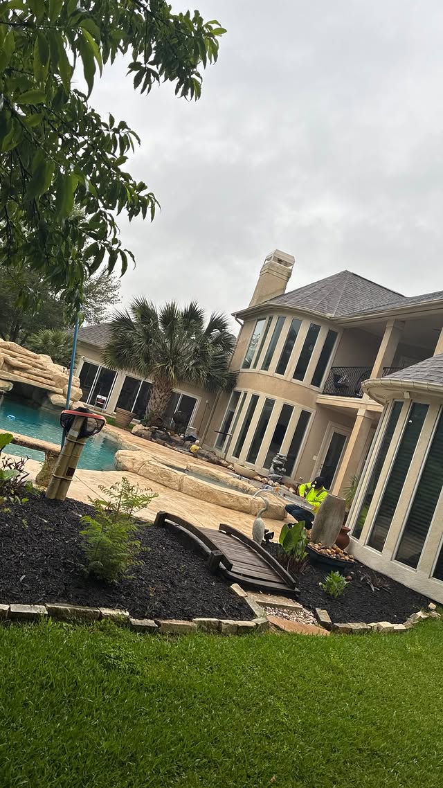 Outdoor living flower bed design after